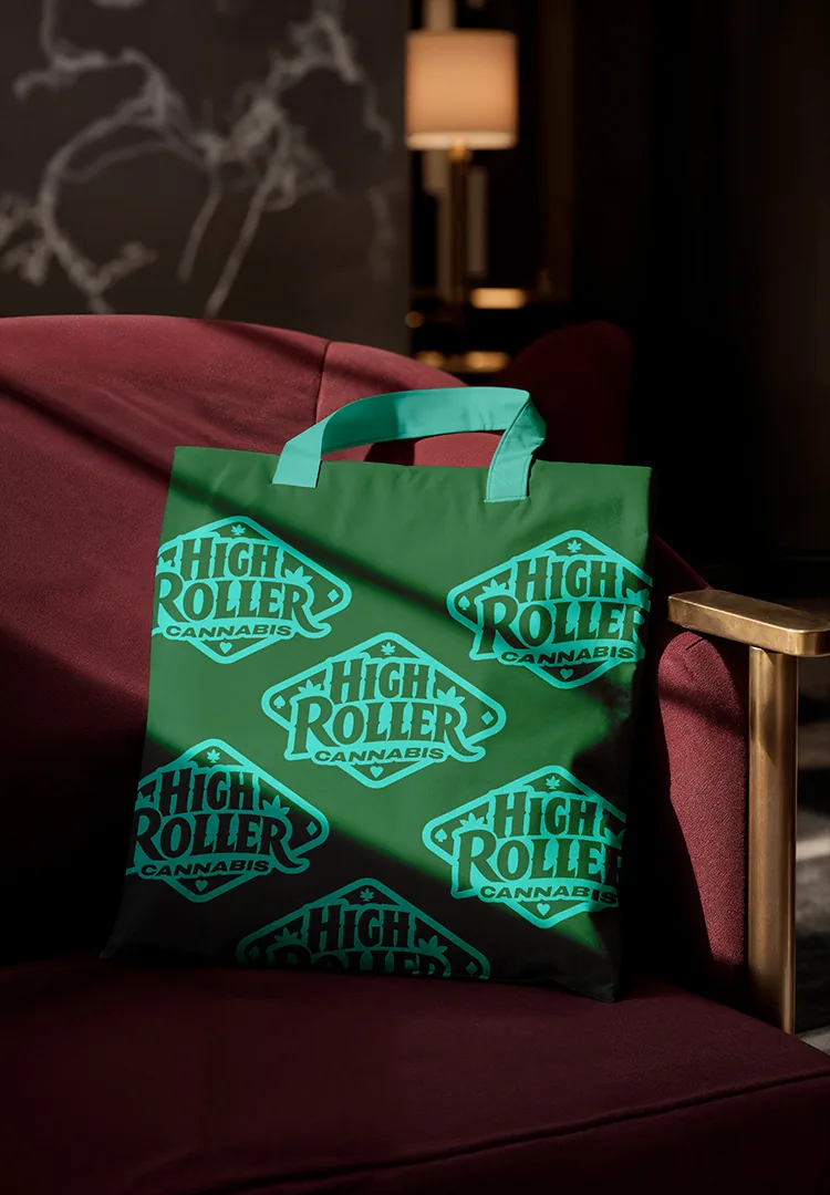 The High Roller Cannabis tote on a velvet lounge chair
